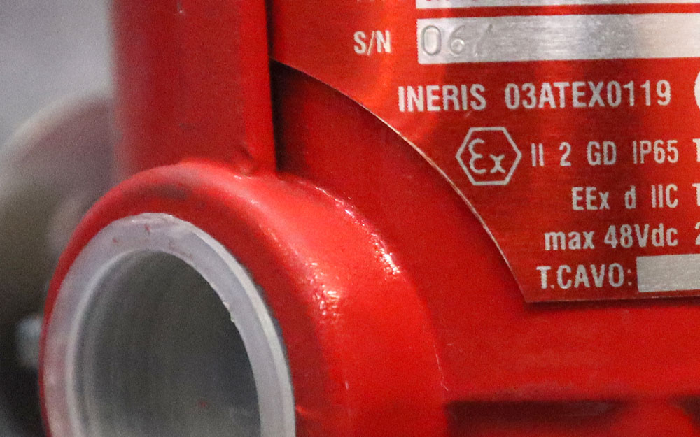 ATEX logo on a heat detector assembly